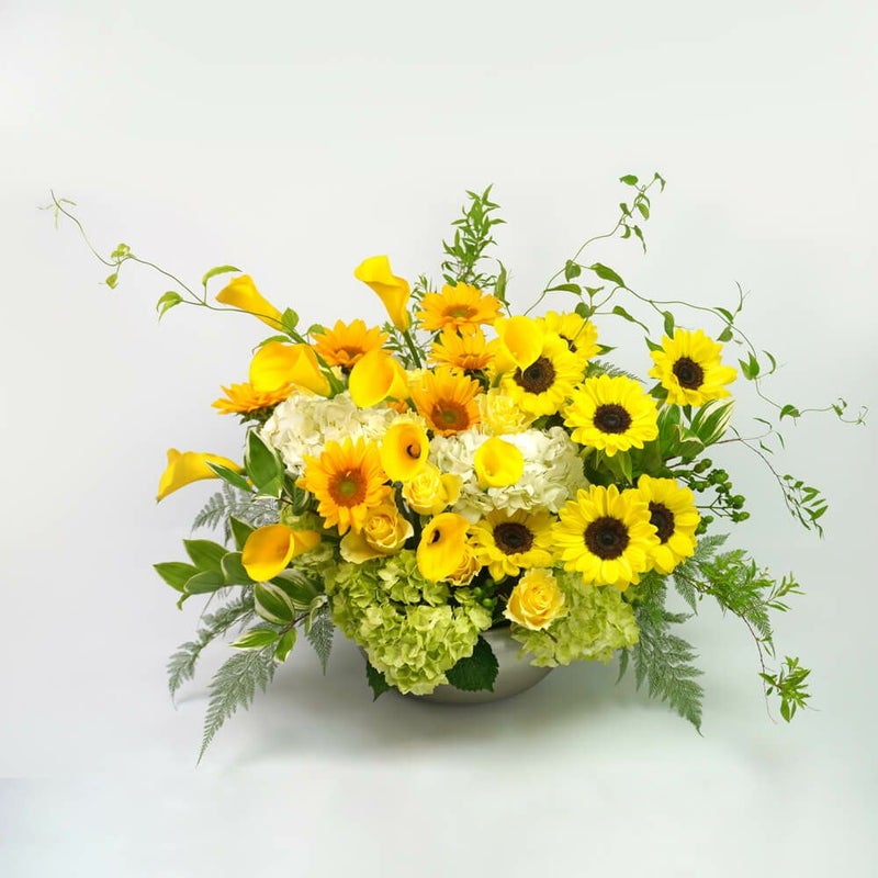 ヒマワリとカラーのアレンジメント