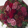 【クリスマス】赤とピンクの大輪バラやカーネーションの花束